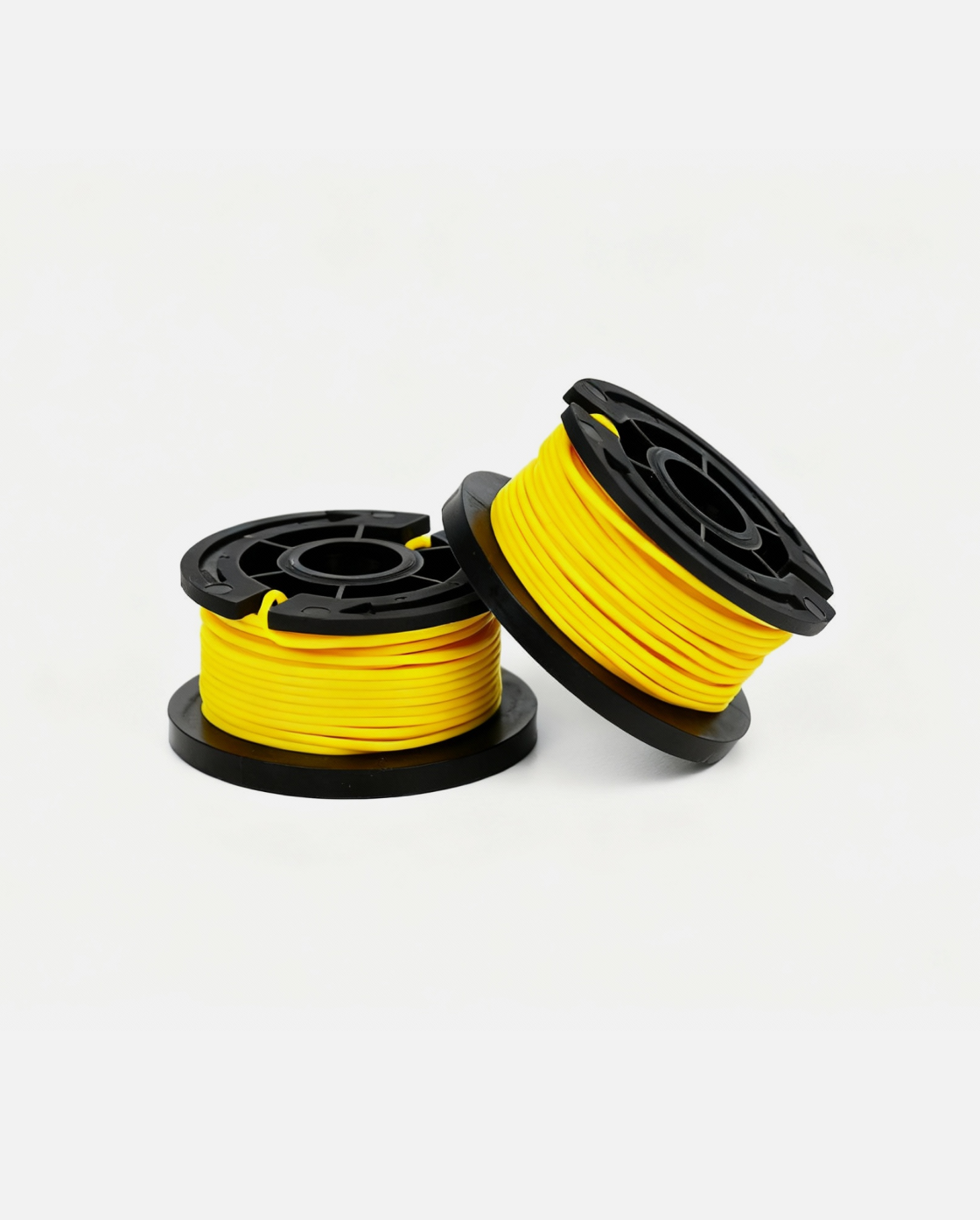 Yellow trimmer line spool with black plastic casing, two units shown side by side on white background