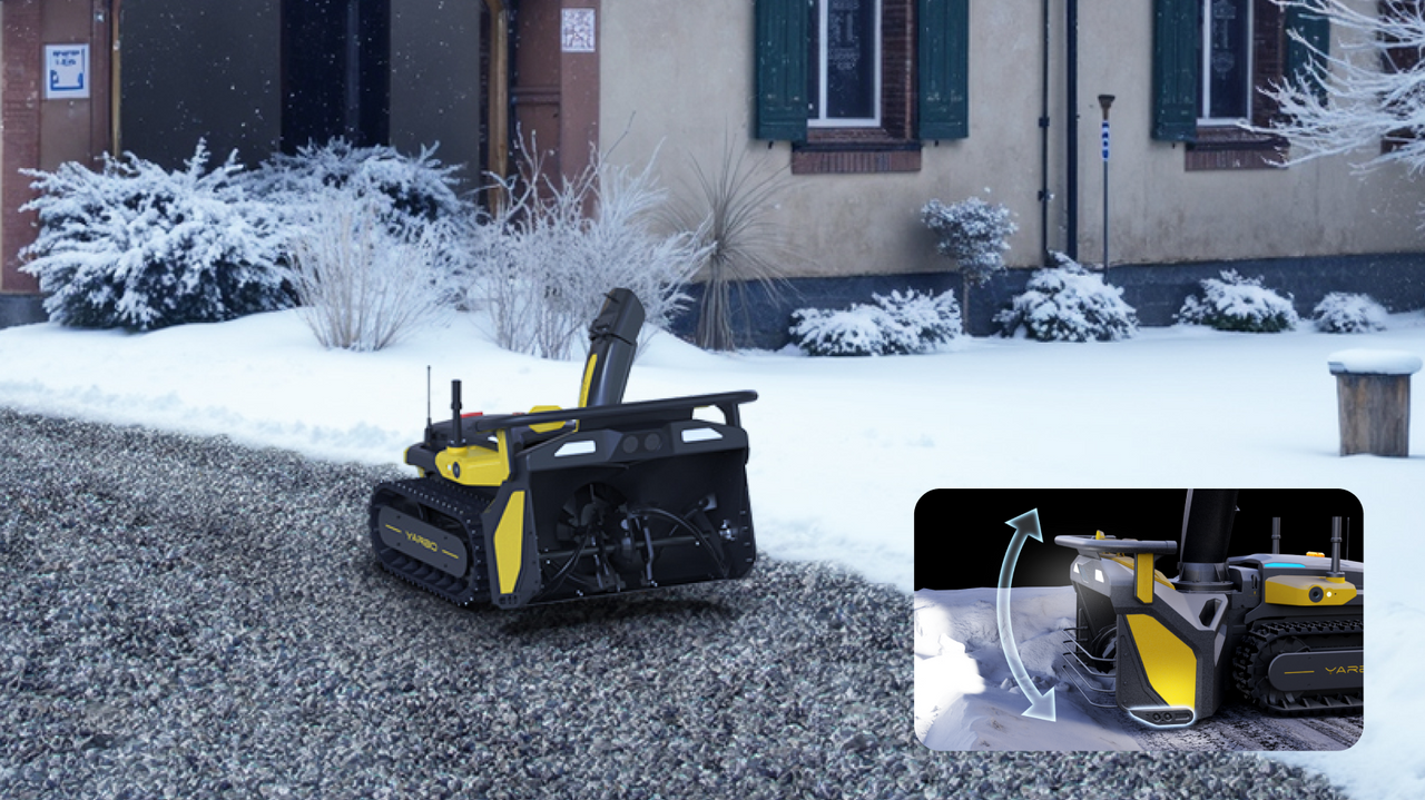 Black and yellow YARD robot snow blower on gravel path, clearing snow near building; inset shows adjustable chute.