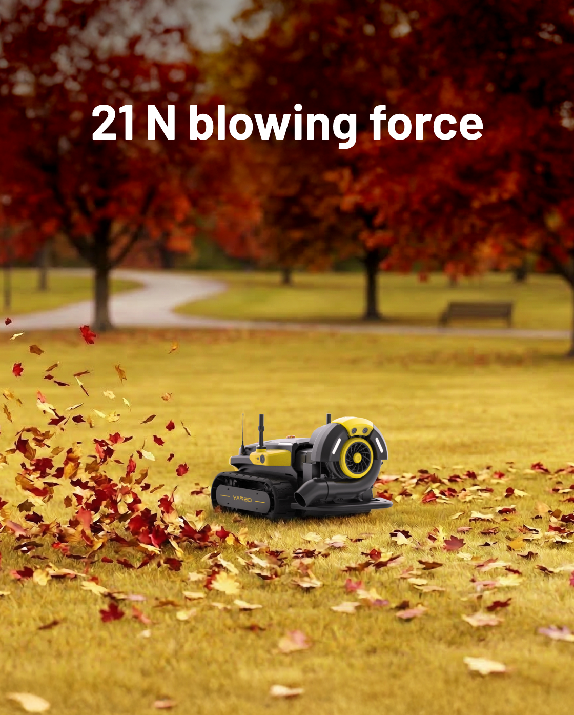 Yellow and black robotic leaf blower by Yarbo on grass, blowing autumn leaves in park setting, side view