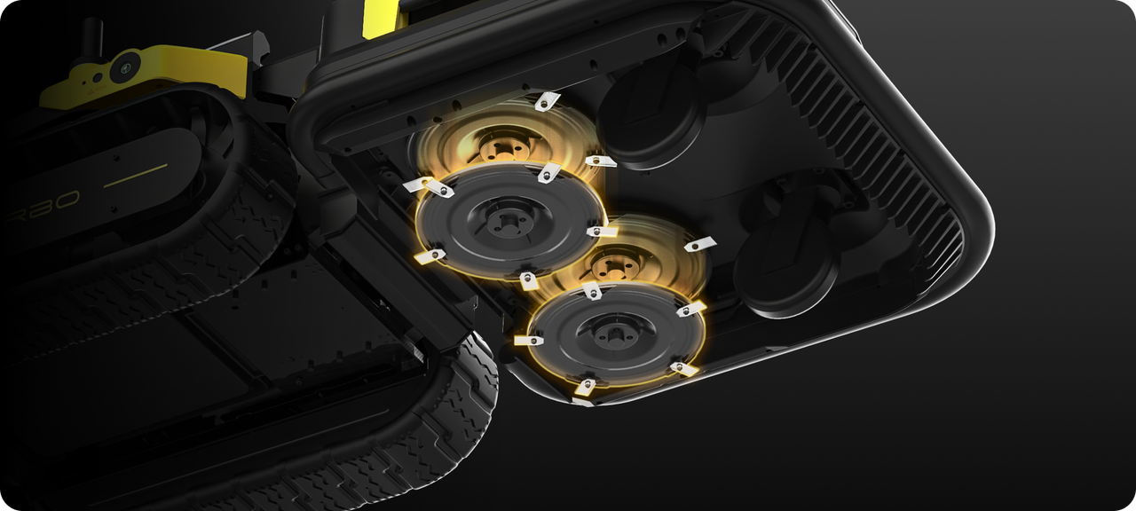Close-up of black robotic device with yellow-accented internal gears and tank treads, illuminated against dark background.