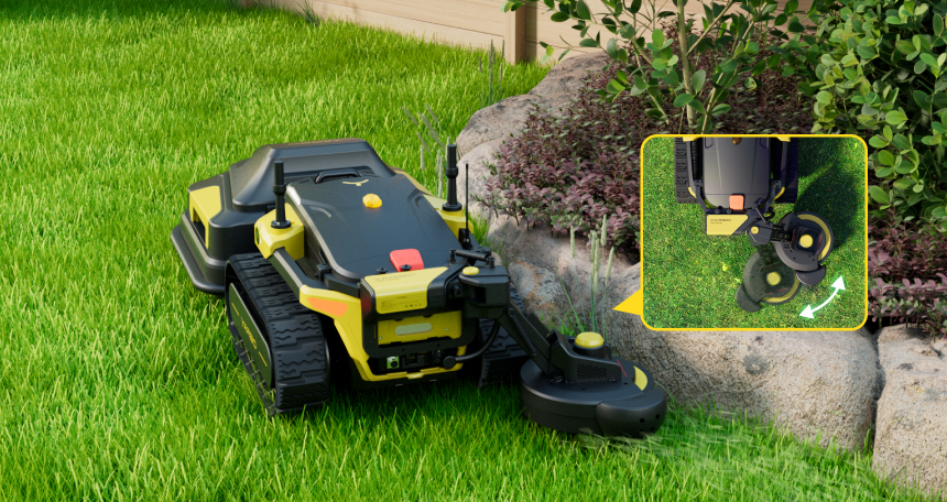 Yellow and black robotic lawn mower on green grass near rocks and shrubs, inset shows cutting blades in action.