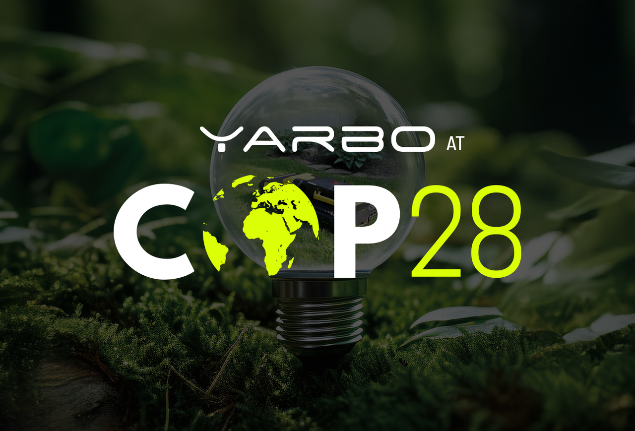 Lightbulb with glowing green Earth map, mossy background, text "YARBO at COP28" in white and green.