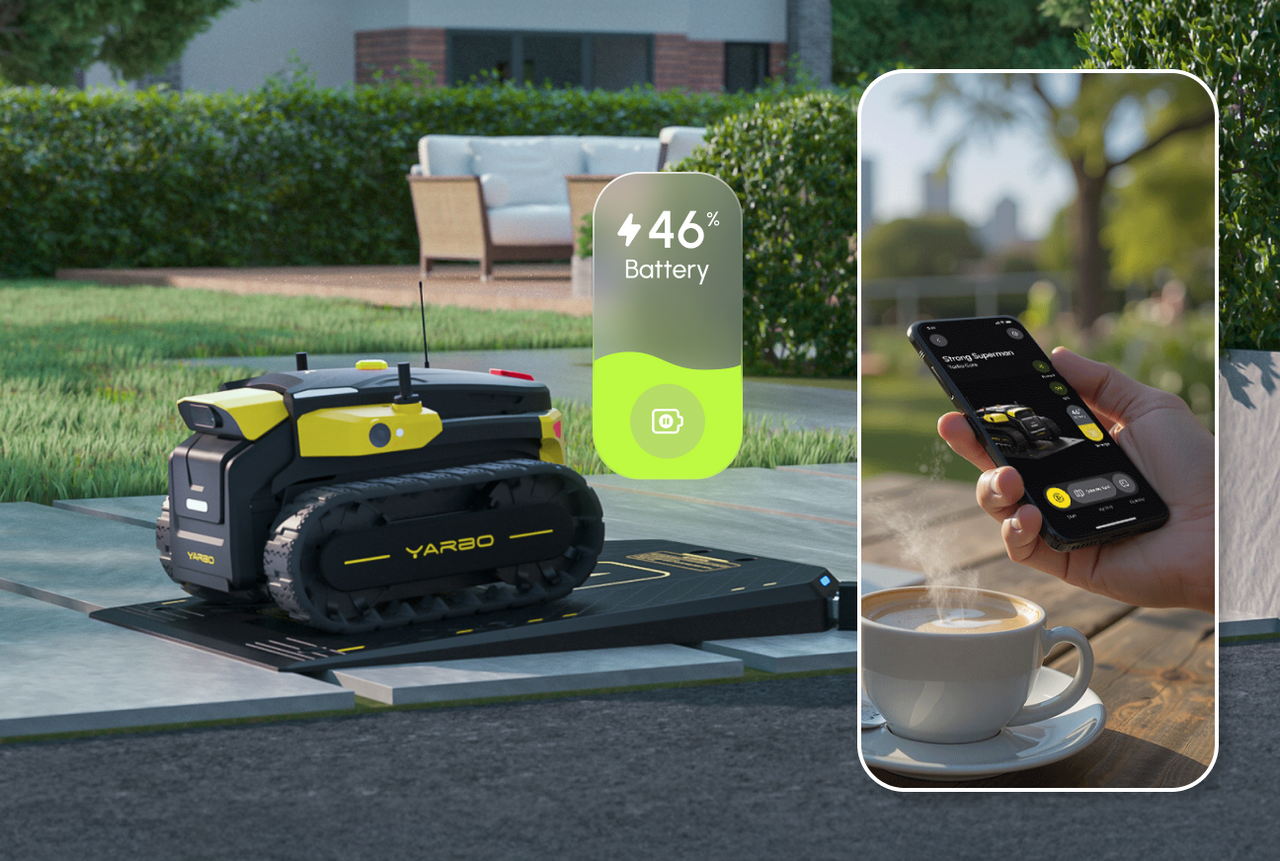 Black and yellow YARBO robotic lawn mower on charging dock, 46% battery shown, with inset of hand holding phone controlling mower, coffee cup nearby.