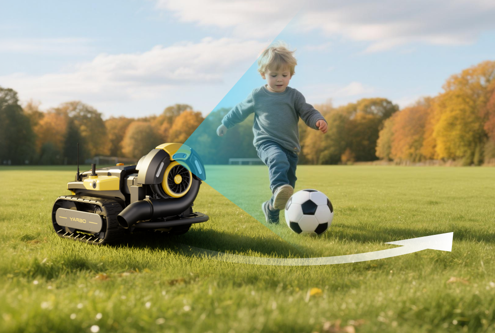 Yellow and black YARBO robot mower on green lawn beside child kicking soccer ball, autumn trees in background, sunny day.