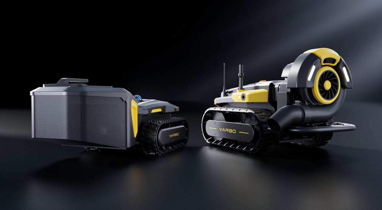 Two black and yellow YARBO robotic units with tracks, one featuring a large fan and exhaust, displayed on a dark reflective surface.