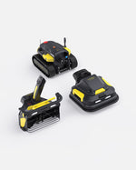 Black and yellow robotic lawn mower and snow blower attachments by Yarbo, shown in three angled views with tracked base and modular design